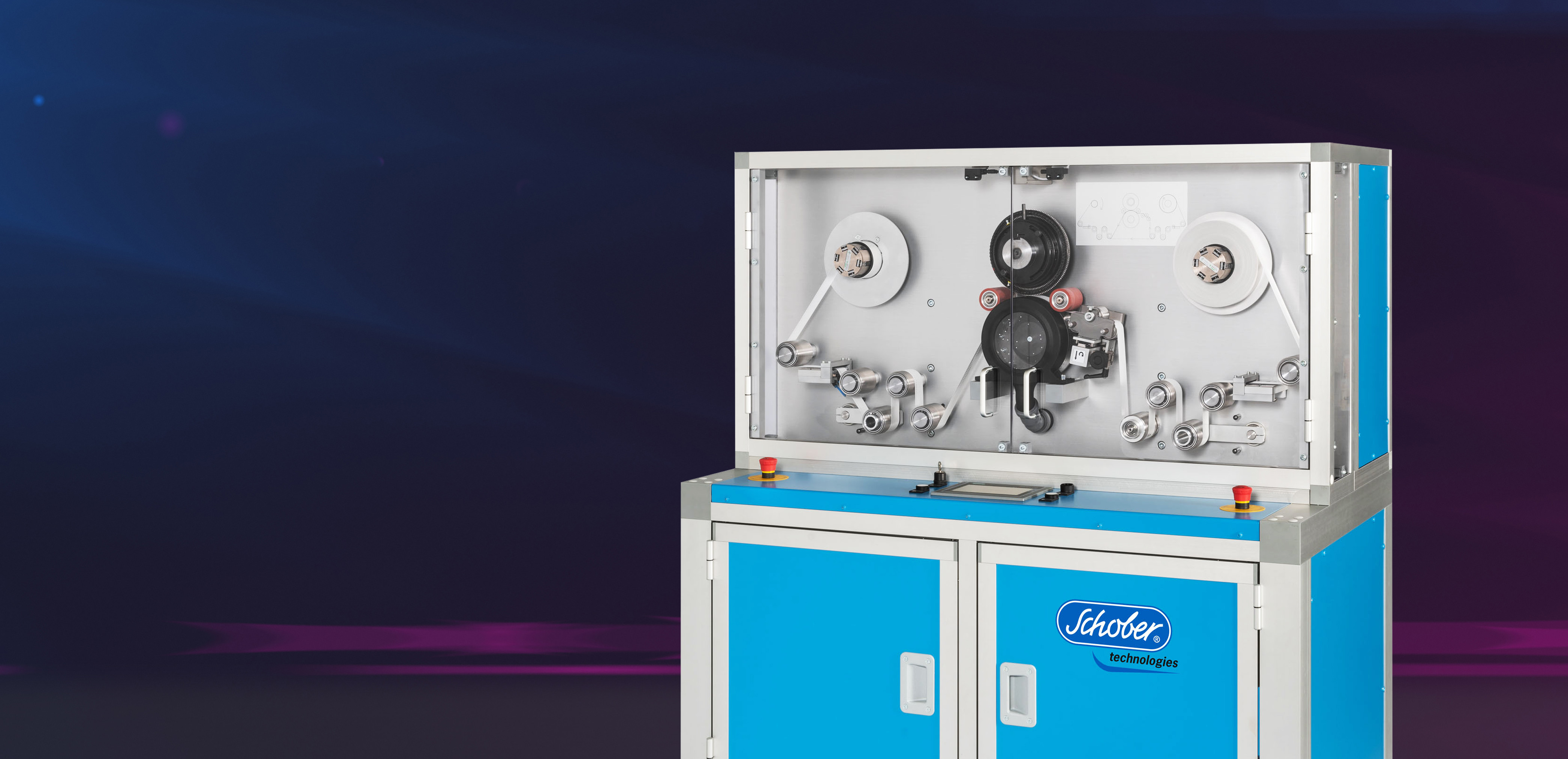 FLSM Schmalbahn Rotationsstanzmaschine steht neben Schobi auf blauem Hintergrund